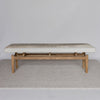 full view front on of the Hide bench seat in cream and earthy tones by Corcovado Design