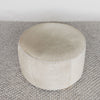 top view of the light cream colored hair on hide ottoman from corcovado designs