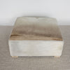 caramel brown and creamy colored square hide ottoman coffee table