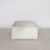 square cowhide coffee table ottoman in earthy tones and gray by corcovado design