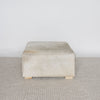 square cowhide coffee table ottoman in earthy tones and gray by corcovado design