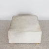 square cowhide coffee table ottoman in earthy tones and gray by corcovado design