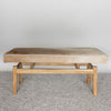 front view of he caramel cream colored cowhide bench seat by Corcovado