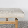 detailed close up view of a cream and gray colored hide ottoman bench by Corcovado