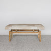 front view of the dark caramel hide bench from corcovado designs