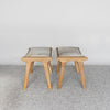 Set of two small hide stools for entryway or foot of bed