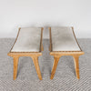 top view of the pair of small cowhide bench seat stools with white and grey hide