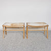 pair of two hide benches in caramel hide