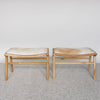 pair of two hide benches in caramel hide