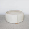 extra large cowhide round ottoman in light colored tones