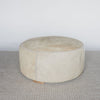 extra large cowhide round ottoman in light colored tones