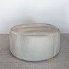 extra large earthy colored round hide ottoman footstool from corcovado designs