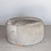 dark gray colored natural cowhide ottoman coffee table