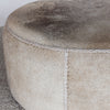 close up of the dark gray colored natural cowhide ottoman coffee table