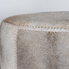 close up detail of the dark gray colored natural cowhide ottoman coffee table