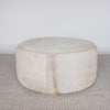 light cream and caramel colored hide ottoman coffee table by corcovado design