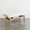 angled view of the light colored hide bench seat from corcovado