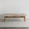 long cowhide bench seat for end of bed bench in earthy tones