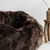 close up of dark brown sheepskin beanbag chair